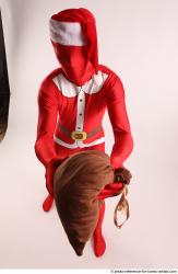 JOEL_ADAMSON CHRISTMAS VILLAIN WITH BAG